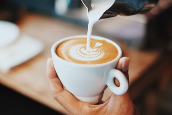 person making latte art